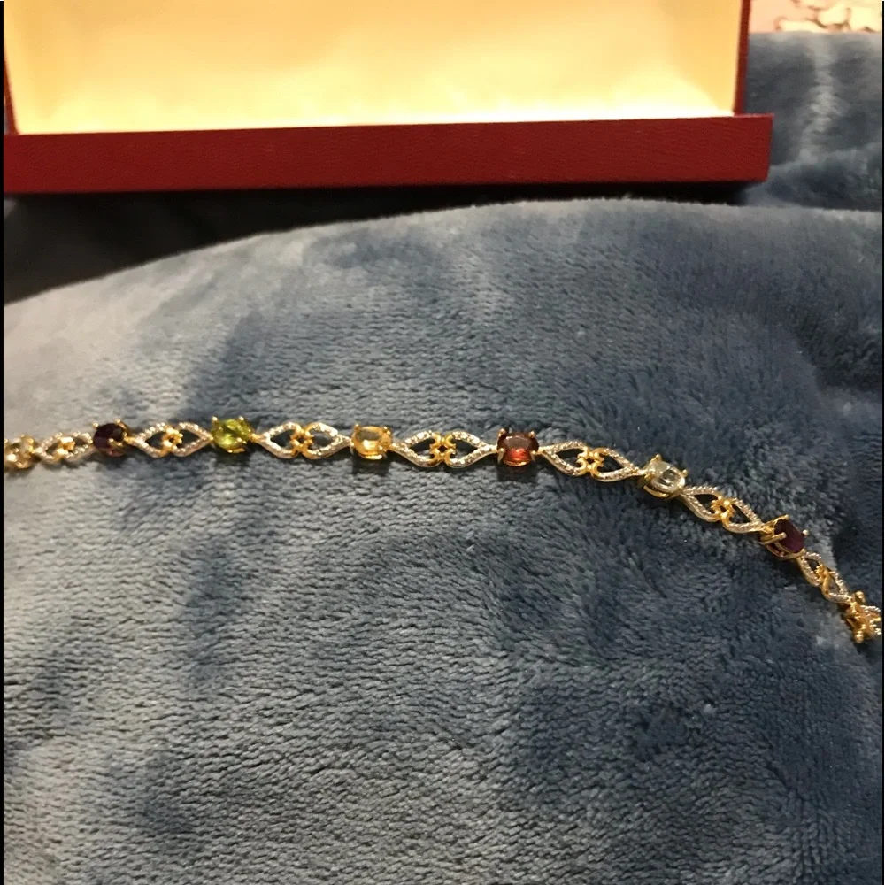 Gorgeous 18kt Gold over Sterling Silver with Genuine Stones and Diamond accents. - Picture 7 of 9